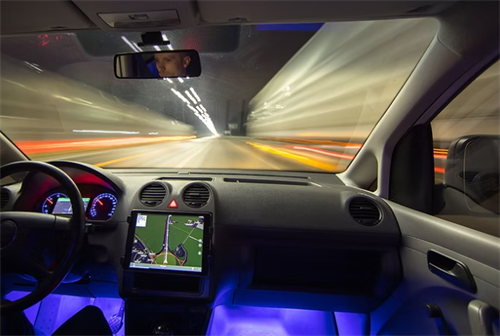 View from inside a car showing a GPS navigation system, representing the basic driver-assist features common in L2 systems.